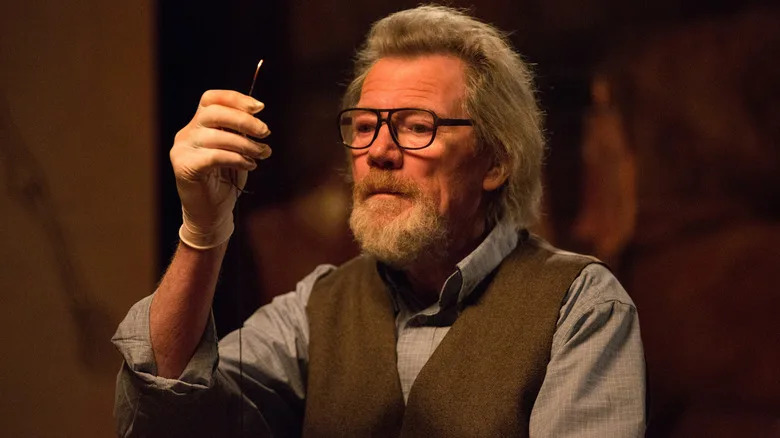 Michael Parks as Howard holding a needle in Tusk