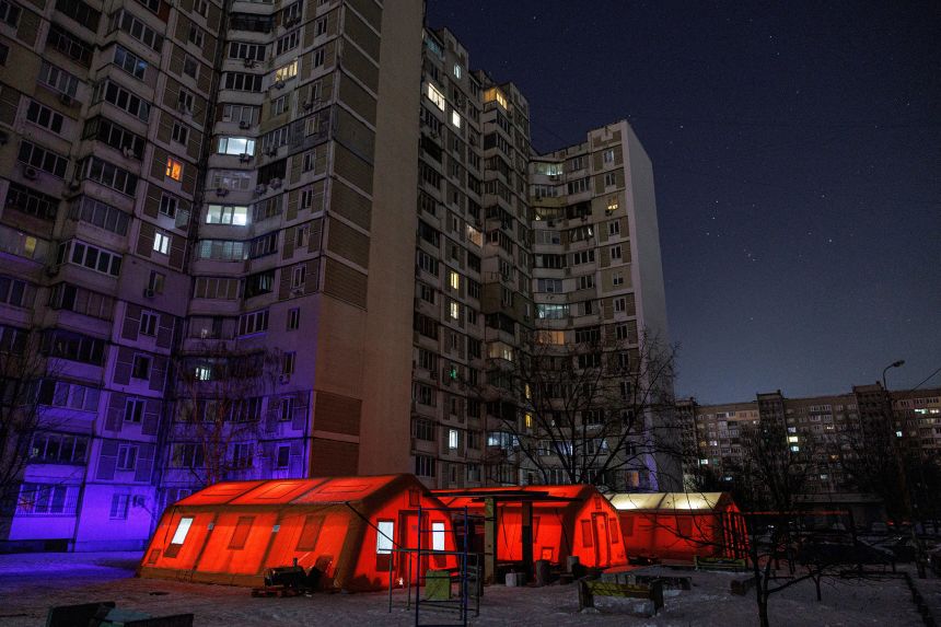 A government-run humanitarian aid point in Kyiv has tents where residents can warm up, charge their devices, and get hot drinks and psychological support during the power blackout caused by recent Russian strikes on energy infrastructure.