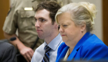 Tyler Robinson, suspect in the fatal shooting of Charlie Kirk, sits beside defense attorney Kathryn Nester