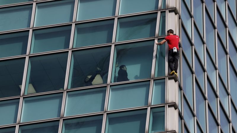 Live updates: Alex Honnold summits Taipei 101 skyscraper in free solo climb