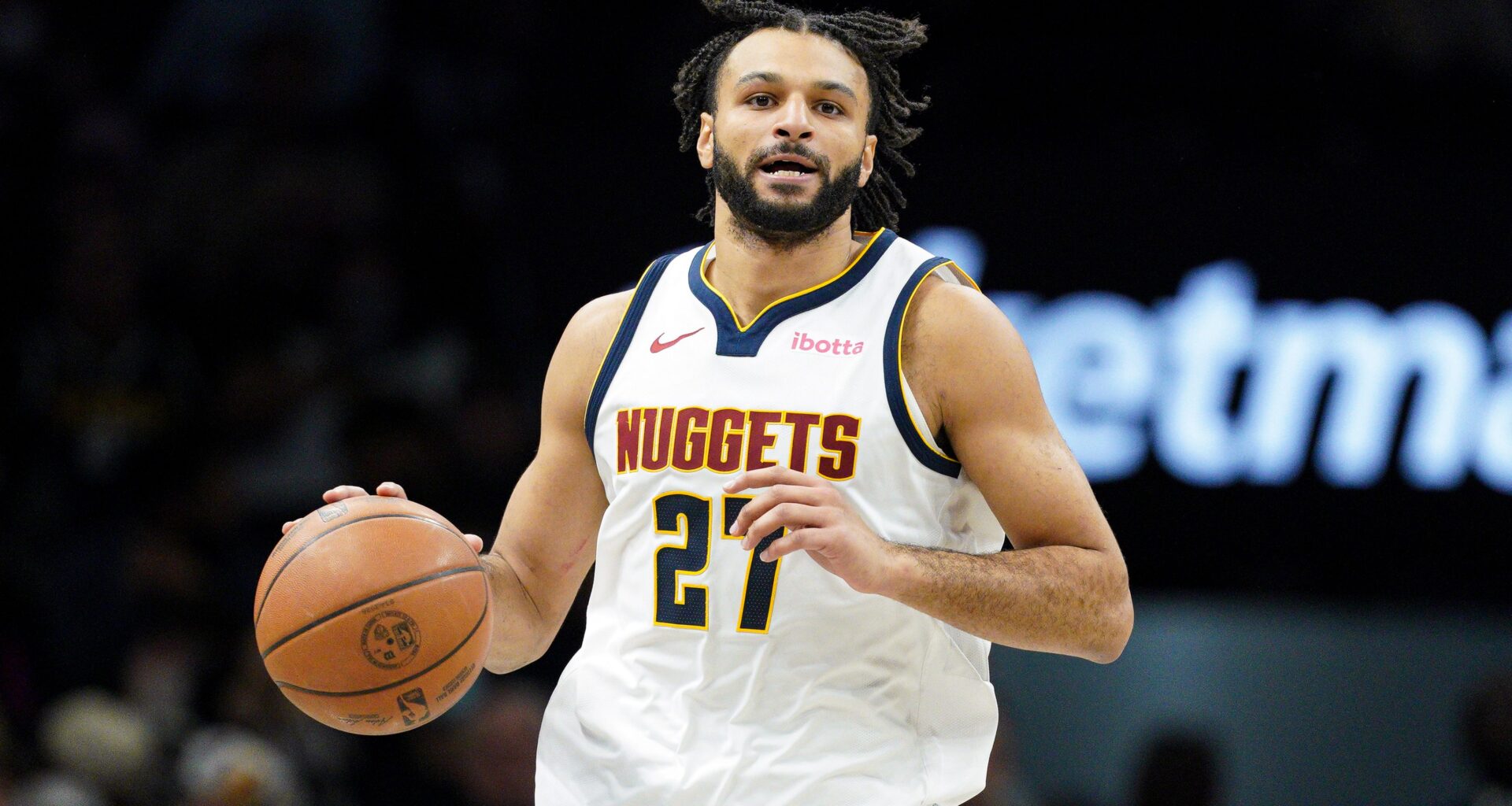 Jamal Murray dribbles the ball