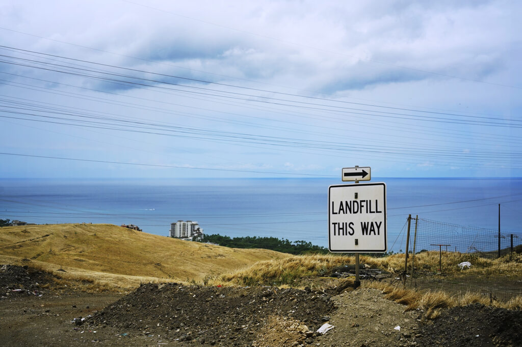 With an amazing view, Waste Management’s Waimanalo Gulch Sanitary Landfill is the last stop on the City and County of Honolulu Refuse Division’s Tour de Trash Wednesday, Aug. 28, 2024, in Kapolei. The tour follows the journey of Oahu residents and visitors’ rubbish, recyclable items and compostable/green waste take through the collection and disposal process. (Kevin Fujii/Civil Beat/2024)