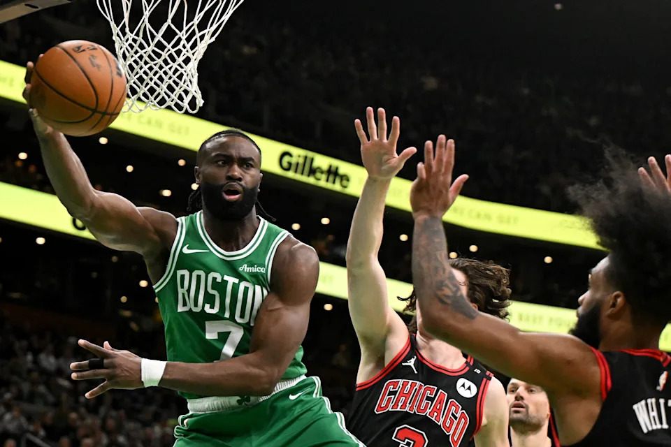 BOSTON, MASSACHUSETTS - JANUARY 29: Jaylen Brown #7 of the Boston Celtics passes the ball against Coby White #0 of the Chicago Bulls during the second quarter at the TD Garden on January 29, 2025 in Boston, Massachusetts. NOTE TO USER: User expressly acknowledges and agrees that, by downloading and or using this photograph, User is consenting to the terms and conditions of the Getty Images License Agreement. (Photo by Brian Fluharty/Getty Images)