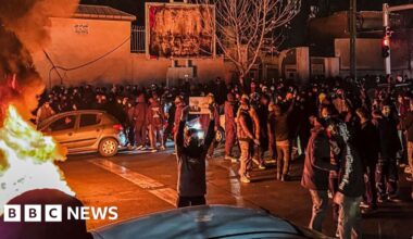 Iran warns it will retaliate if US attacks as protesters defy crackdown