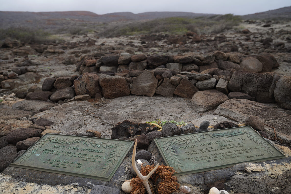 Memorial plaques for James Kimo Mitchell and George Jarrett Helm, Jr., are maintained by Protect Kahoʻolawe ʻOhana (PKO), photographed Monday, Jan. 5, 2026, in Hakioawa. A mystery and conflicting accounts surround their disappearance. (Kevin Fujii/Civil Beat/2026)
