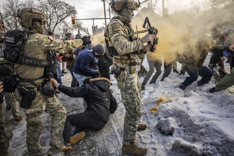 Image: Members of the Border Patrol Tactical Unit use pepper spray on people as they try to leave the scene of a shooting involving a federal immigration officer in Minneapolis, on Wednesday, Jan. 7, 2026. (David Guttenfelder/The New York Times)