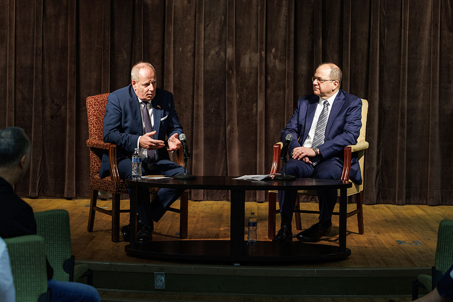 Ambassador Hanefeld sits on the left and Brad T. Gomez, associate professor and chair of the Department of Political Science at FSU, sits on the right on stage in The Globe Auditorium.