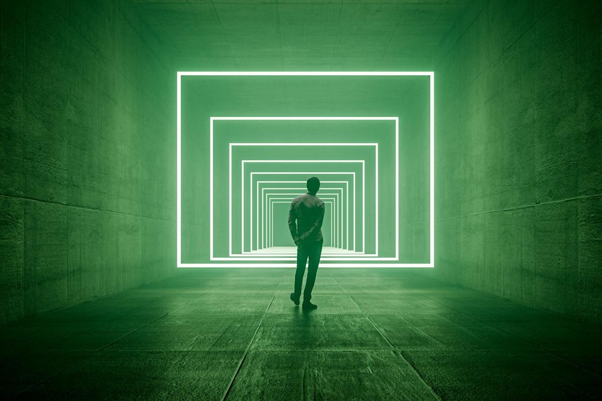 young man standing in vr corridor