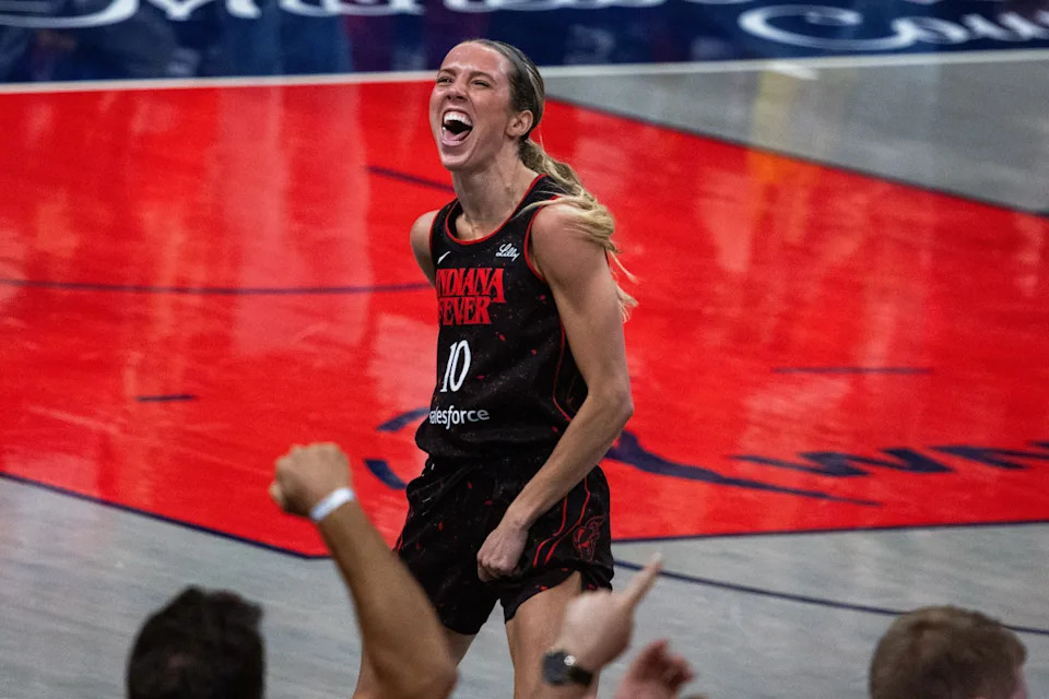 Indiana Fever guard Lexie Hull (10) celebrates a made basket during the WNBA playoffs.Trevor Ruszkowski-Imagn Images