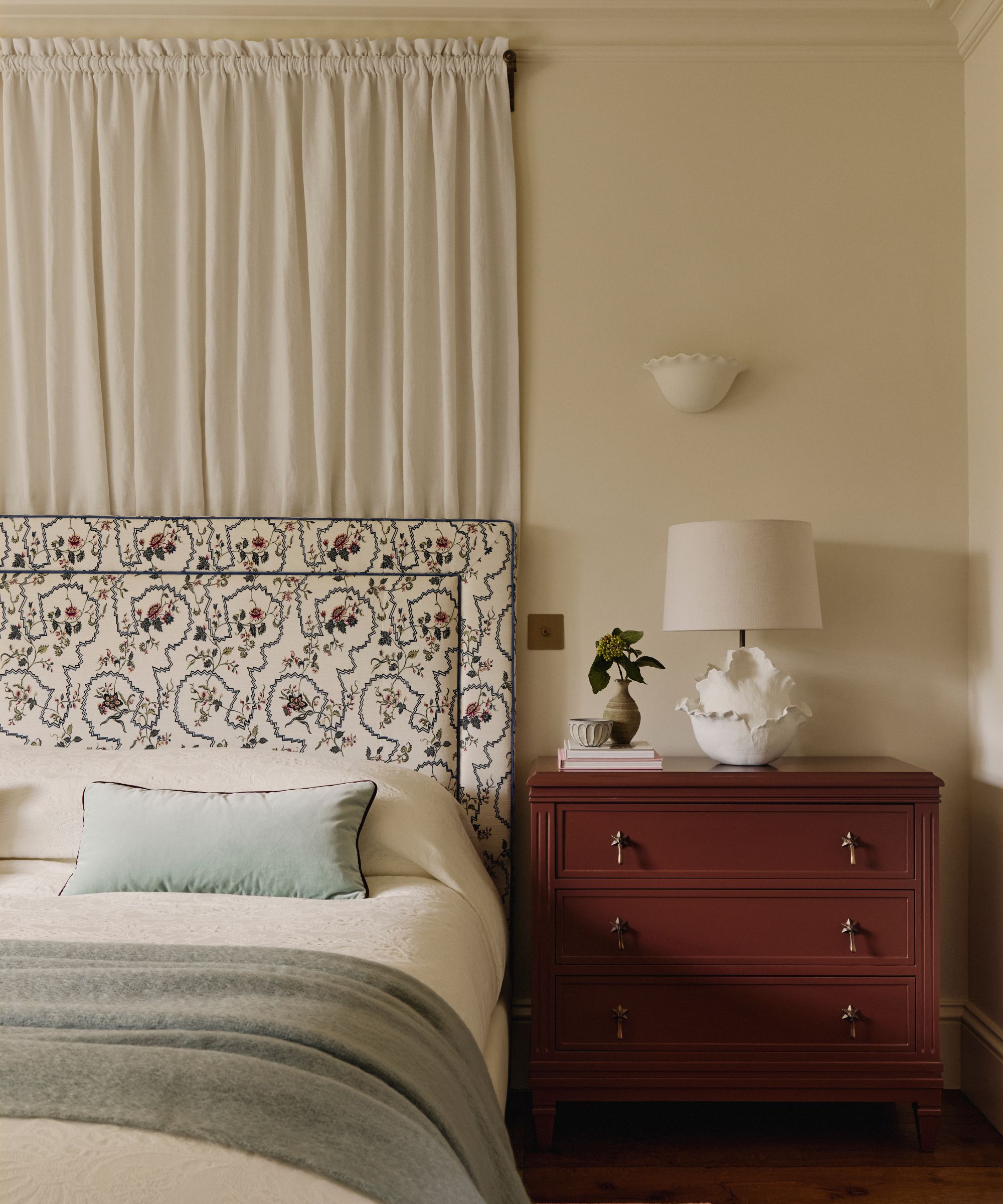 a neutral cozy bedroom in london by Emma Ainscough