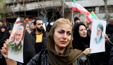 Iran warns of retaliation if Trump strikes, US withdraws some personnel from bases