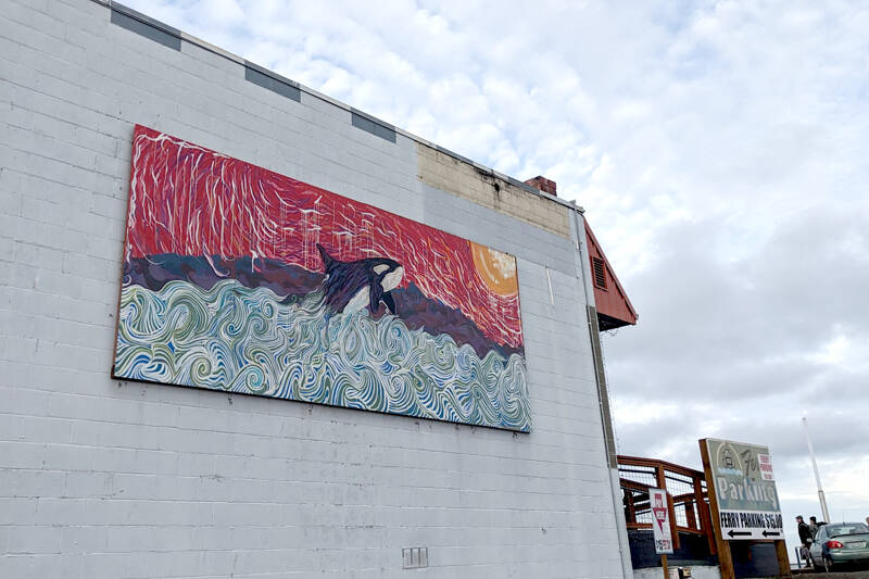 About 100 people dipped three times into the water during the 38th annual Polar Bear Dip on Thursday at Hollywood Beach in downtown Port Angeles. The air and water temperature were both in the low 40s. Each received a certificate for participating, and proceeds benefitted Volunteer Hospice of Clallam County. (Dave Logan/for Peninsula Daily News)