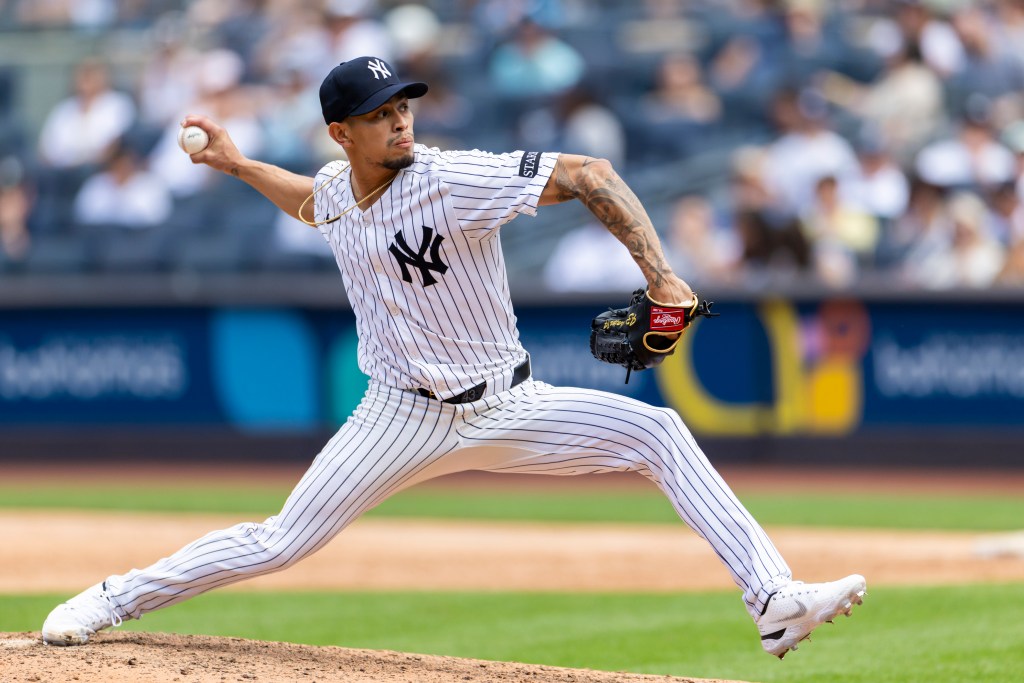 Jonathan Loáisiga #43 pitching against the Athletics.
