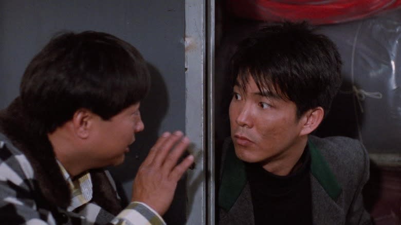 Sammo Hung as Wong and Yuen Biao as Tung, making plans in Dragons Forever