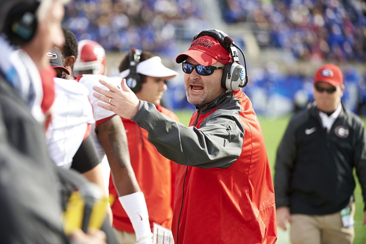 Georgia outside linebackers coach Kevin Sherrer works during an SEC game against Kentucky on Nov. 8, 2014, in Lexington, Ky.