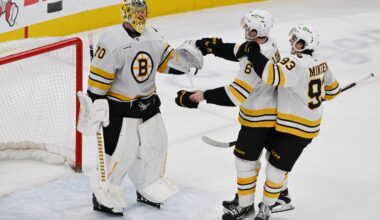 Bruins defenseman Mason Lohrei (6) scored a pair of goals in Saturday night's victory over the Blackhawks, and was the first to congratulate goalie Joonas Korpisalo on notching the win.