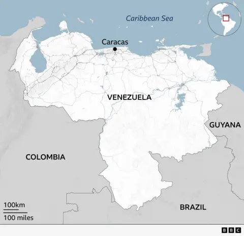 Map showing Venezuela and its immediate neighbors in northern South America. Venezuela is highlighted in white with Caracas marked by a black dot in the centre of its northern coast. Colombia is shown to the west and Guyana to the east. The Caribbean Sea borders the north. 
