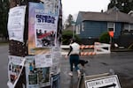 A poster on Northeast Killingsworth Street in Portland, Ore. calls for a Jan. 30 general strike on Thursday, Jan. 29, 2026.