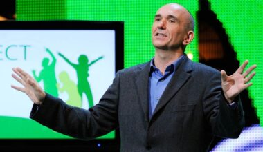 Peter Molyneux stands on stage at an Xbox show.