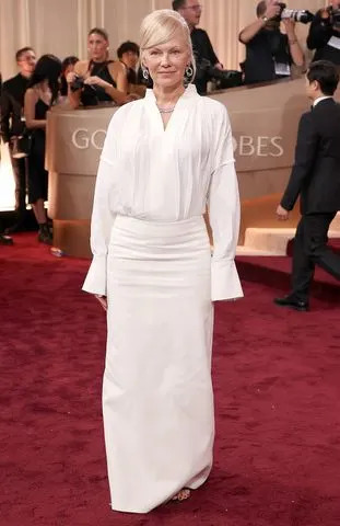 Kevin Mazur/Getty  amela Anderson attends the 83rd annual Golden Globe Awards at The Beverly Hilton on Jan. 11, 2026