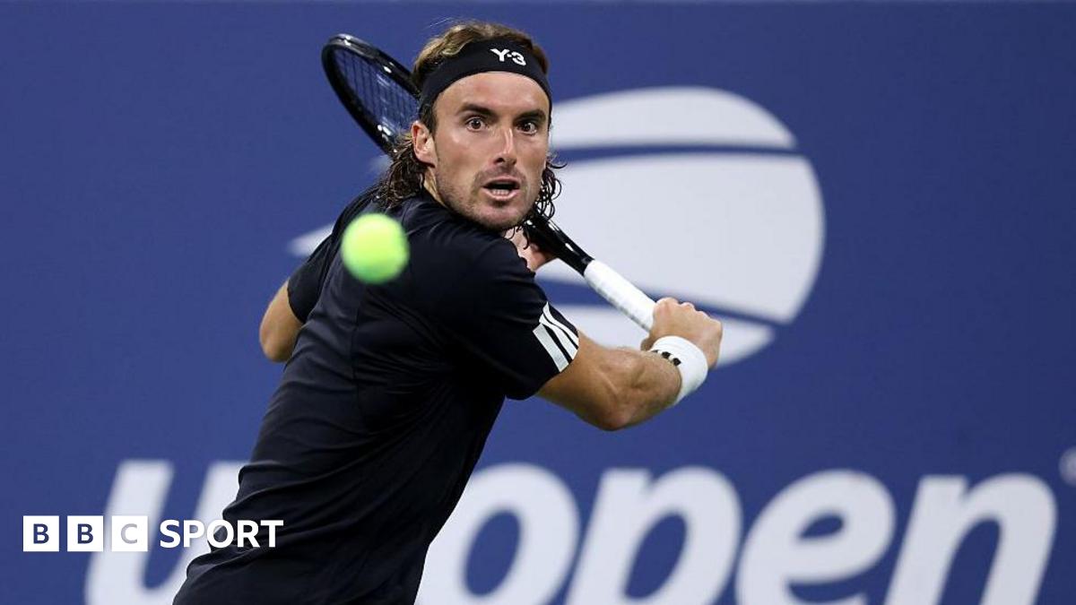 Stefanos Tsitsipas hits a shot