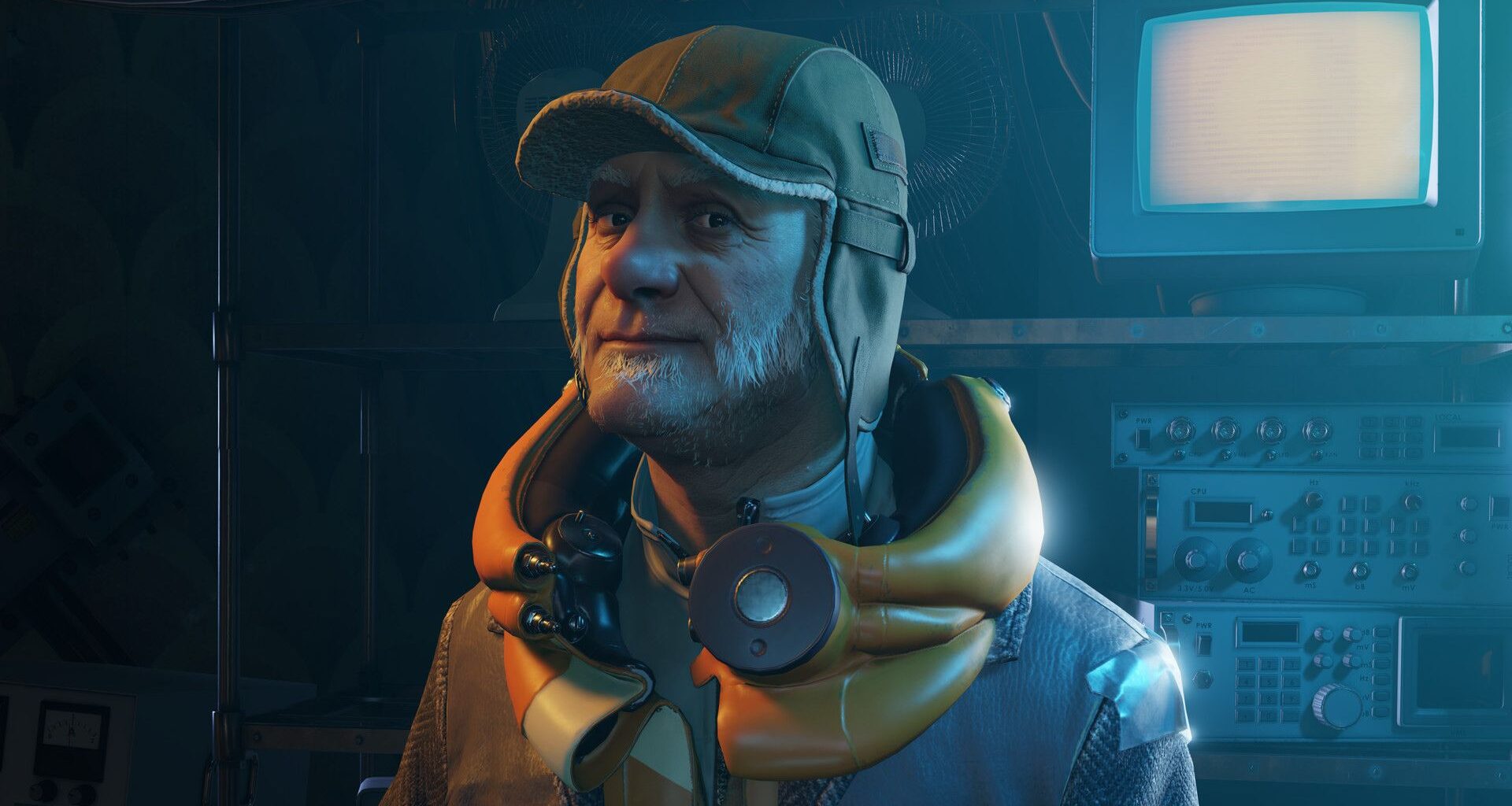 An older bearded man in a cap stood in front of computer equipment in Half-Life Alyx
