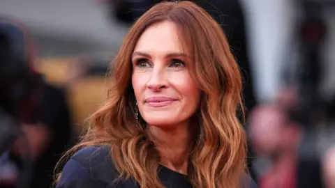Getty Images Julia Roberts attends the "After The Hunt" red carpet during the 82nd Venice International Film Festival on August 29, 2025 in Venice, Italy