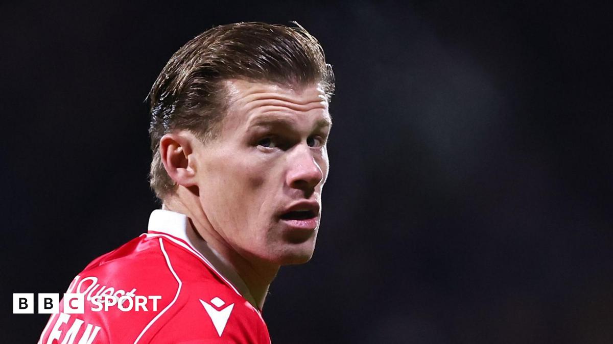 James McClean looks on