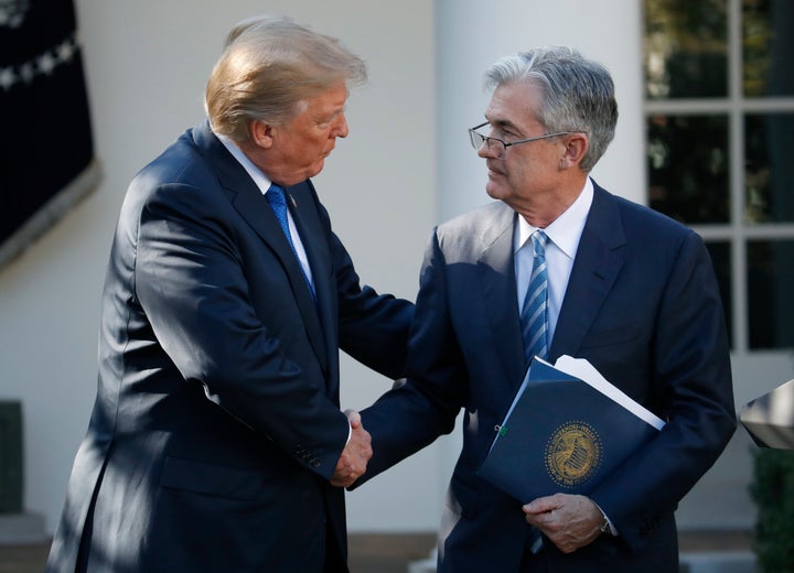 FILE - President Donald Trump shakes hands with Federal Reserve board member Jerome Powell after announcing him as his nominee for the next chair of the Federal Reserve, in the Rose Garden of the White House in Washington, Nov. 2, 2017. (AP Photo/Alex Brandon, File)