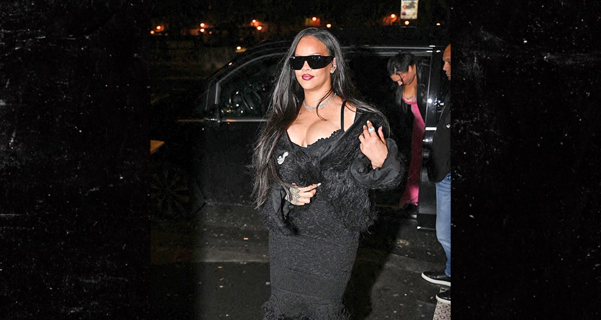 Rihanna Shows Off Her Curves in a Sleek Back Outfit at Paris Fashion Week