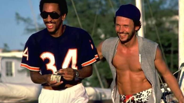 Gregory Hines as Ray and Billy Crystal as Danny, on a Florida vacation in Running Scared