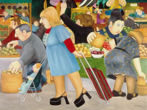 John Cook 2025 A mum dressed in blue with platform heels drags a bag on wheels behind her while pushing a baby in a buggy. Behind her is a busy produce market.