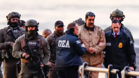 Reuters Venezuelan President Nicolás Maduro arrives at the Downtown Manhattan Heliport as he heads towards the US Courthouse in Manhattan to face U.S. federal charges including narco-terrorism, conspiracy, and drug trafficking
