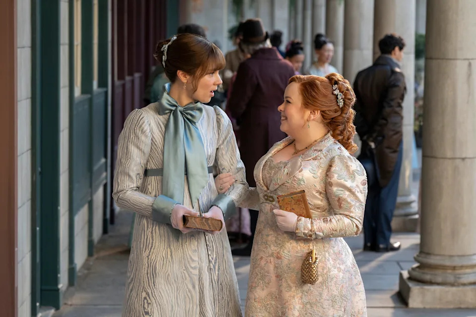 L to R: Claudia Jessie as Eloise Bridgerton and Nicola Coughlan as Penelope Featherington in Season 4 of "Bridgerton."