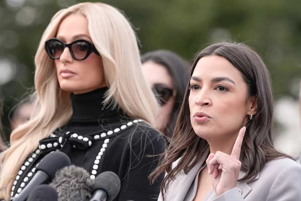 Paris Hilton, left, and Alexandria Ocasio-Cortez at a bipartisan press conference in support of the Defiance Act (AP)