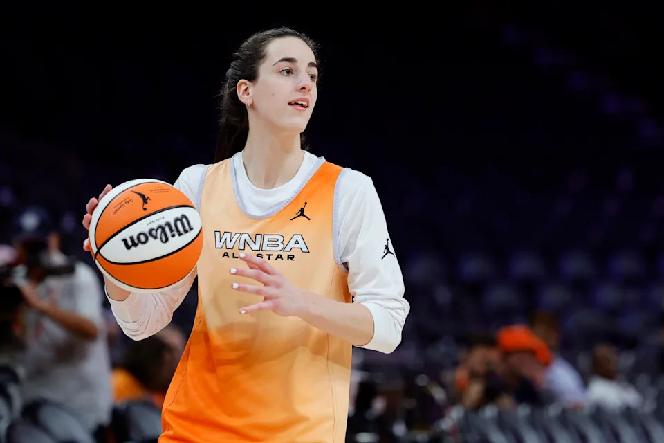 PHOENIX, ARIZONA - JULY 19: Caitlin Clark #22 of Team WNBA looks to pass the ball during a WNBA All-Star Game team practice at Footprint Center on July 19, 2024 in Phoenix, Arizona. NOTE TO USER: User expressly acknowledges and agrees that, by downloading and or using this photograph, User is consenting to the terms and conditions of the Getty Images License Agreement. (Photo by Alex Slitz/Getty Images)Alex Slitz&sol;Getty Images