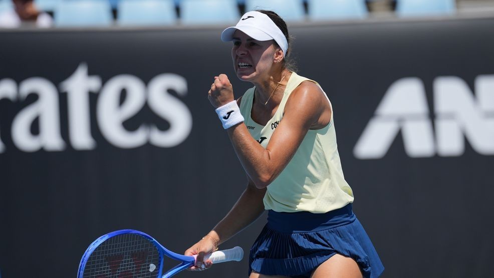 Magda Linette of Poland reacts during her first round match against Emma Navarro of the U.S. at the Australian Open tennis championship in Melbourne, Australia, Monday, Jan. 19, 2026. (AP Photo/Dita Alangkara)
