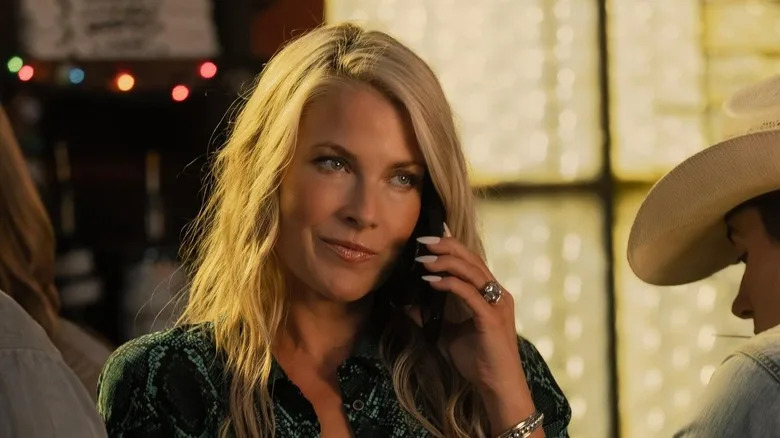 Ali Larter as Angela talking on the phone in Landman