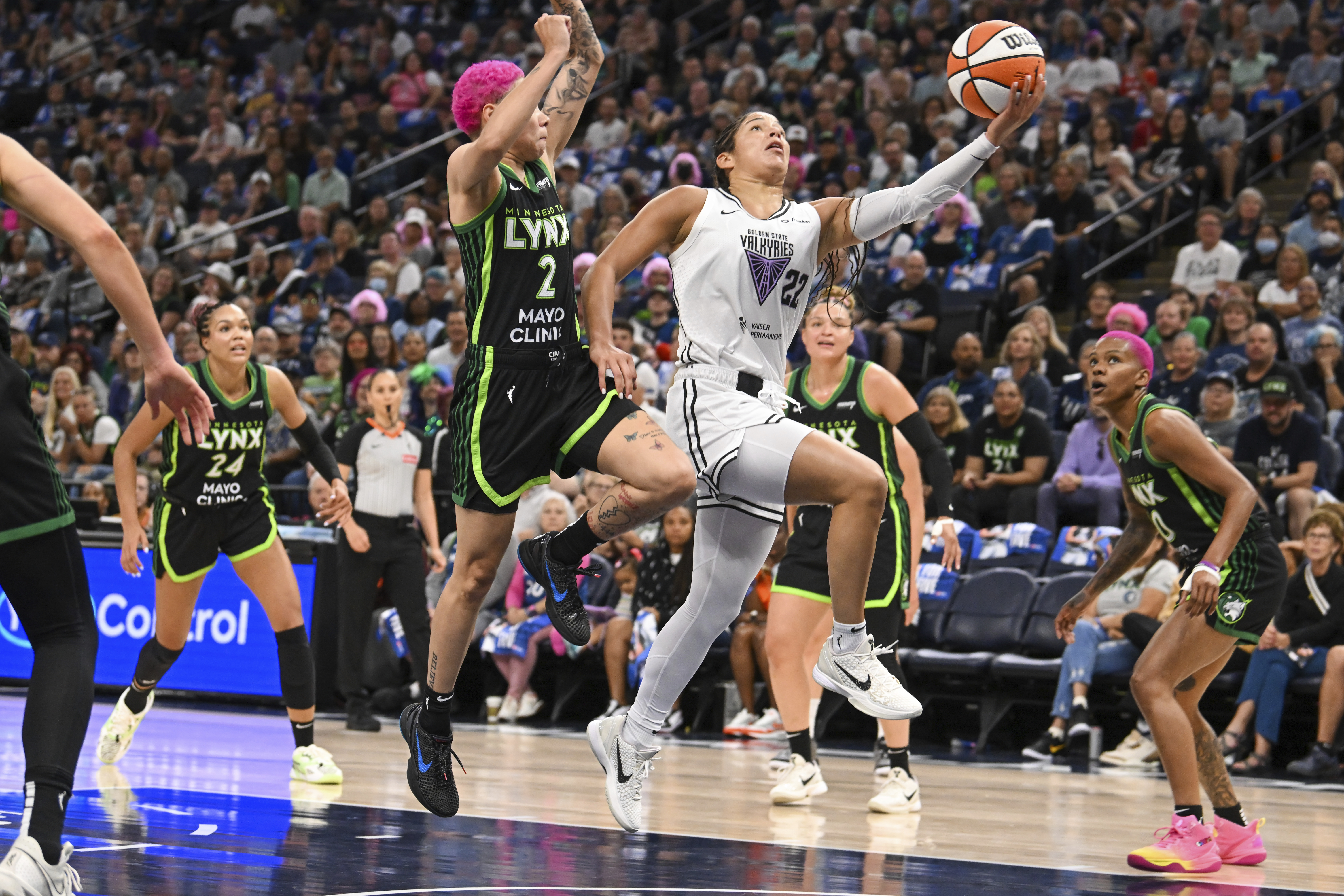 Golden State Valkyries guard Veronica Burton (22) goes up for...