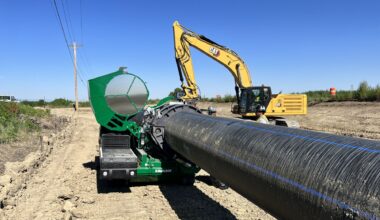 orchestra musicians and conductor on a stage