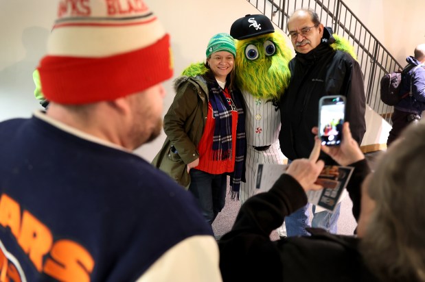 Fans pose for a photo with Southpaw as Chicago White Sox fans arrive at the Ramova Theatre in Chicago's Bridgeport neighborhood for SoxFest on Friday, Jan. 30, 2026. (Chris Sweda/Chicago Tribune)