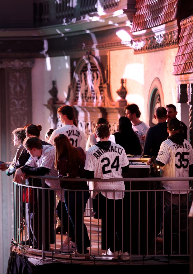 Chicago White Sox players, including prospect Sam Antonacci (24), look on from a balcony during SoxFest at the Ramova Theatre in Chicago's Bridgeport neighborhood on Friday, Jan. 30, 2026. (Chris Sweda/Chicago Tribune)