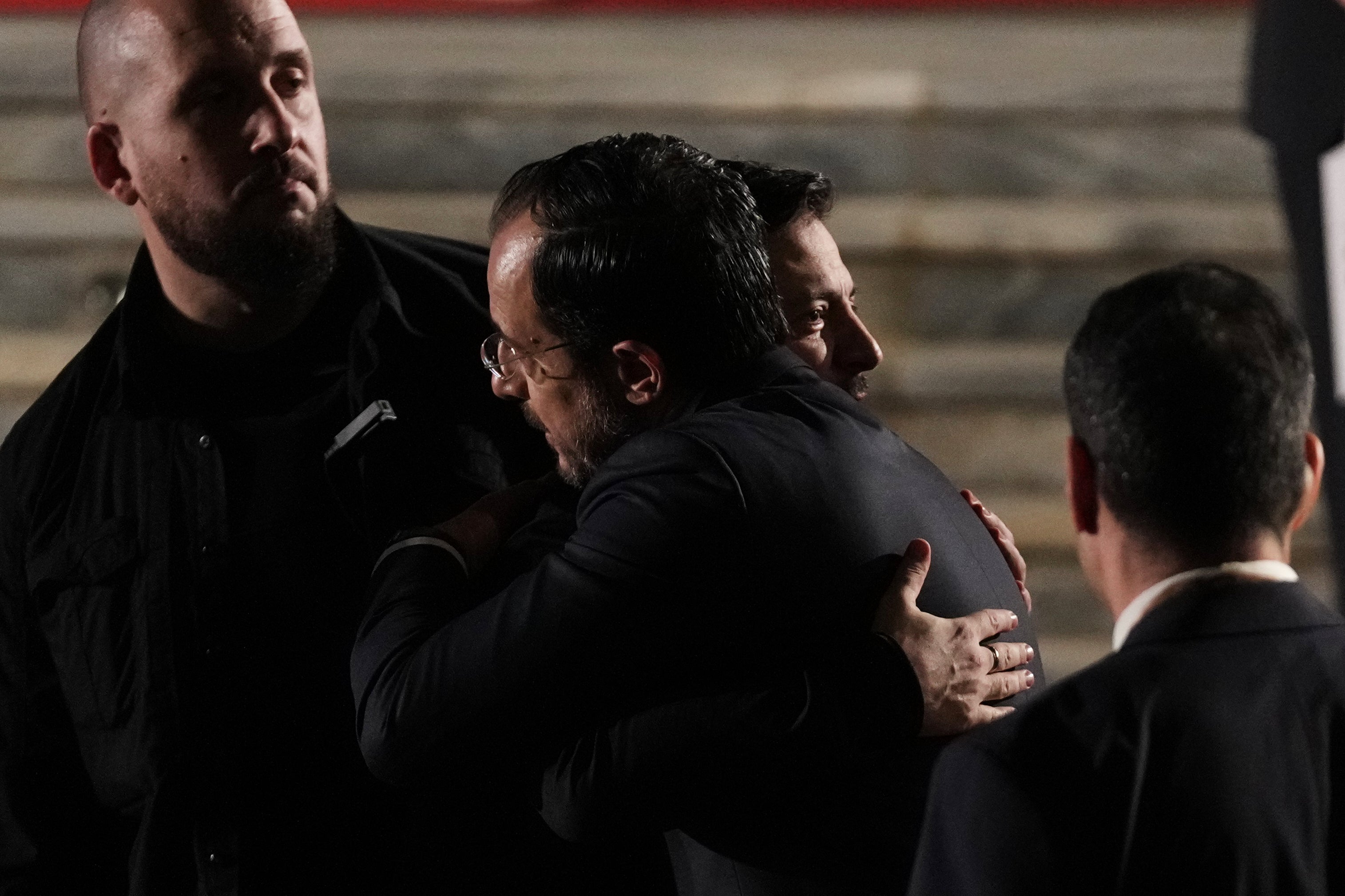 Ukraine's president Volodymyr Zelensky and Cyprus' president Nikos Christodoulides greet each other as they leave a theater in Nicosia, Cyprus