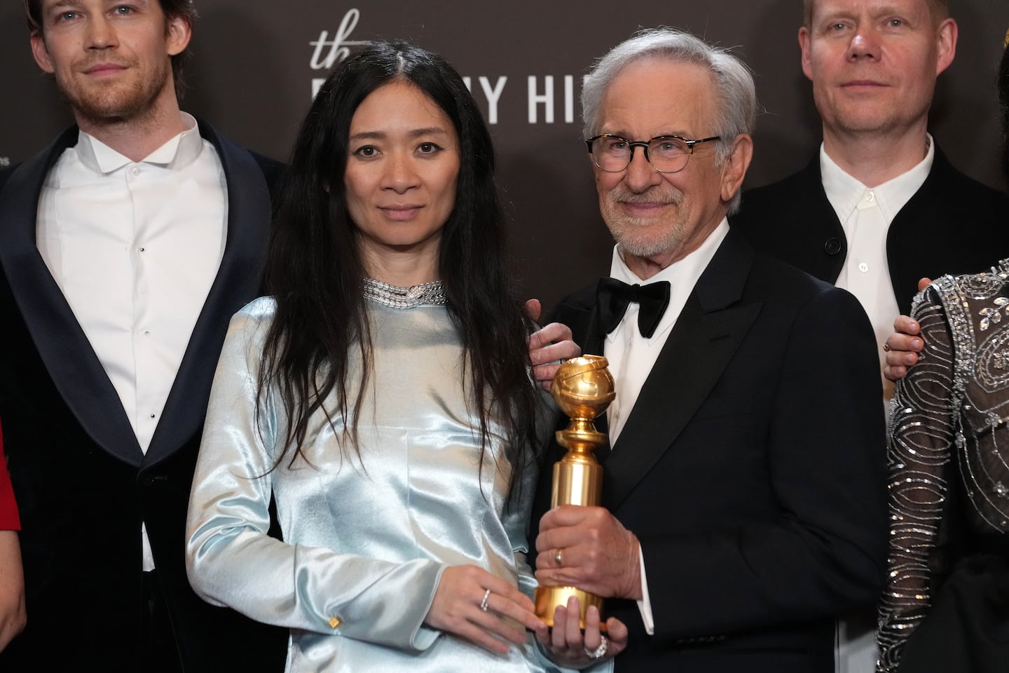 Chloe Zhao, left, and Steven Spielberg posed in the press room with the award for best motion picture - drama for "Hamnet" during the 83rd Golden Globes on Sunday at the Beverly Hilton in Beverly Hills, Calif.