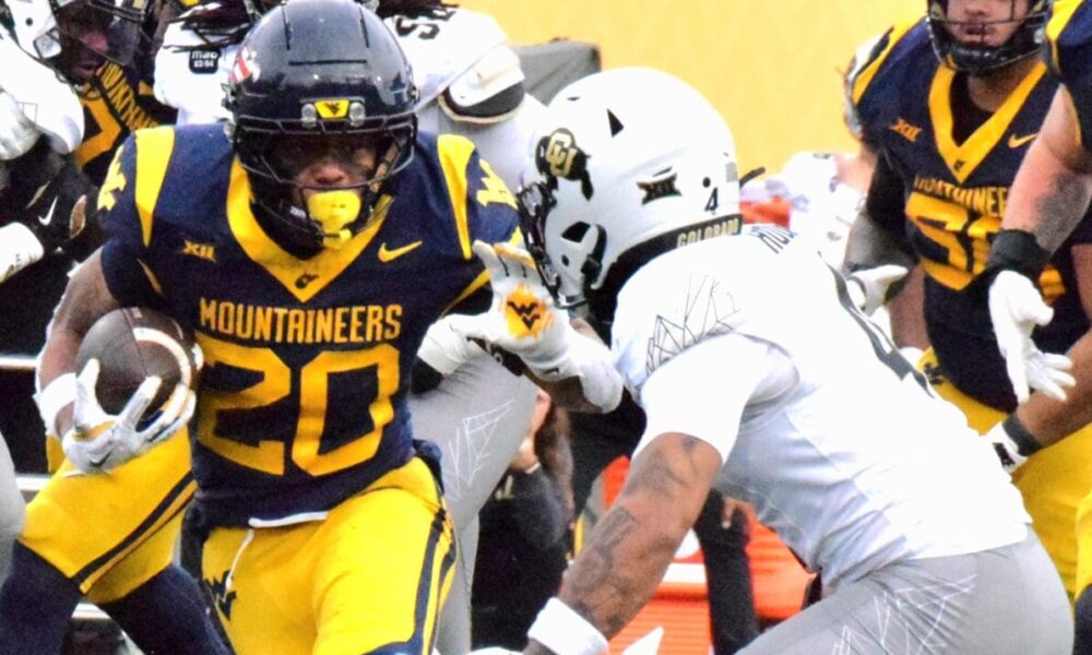WVU Football RB Diore Hubbard against Colorado