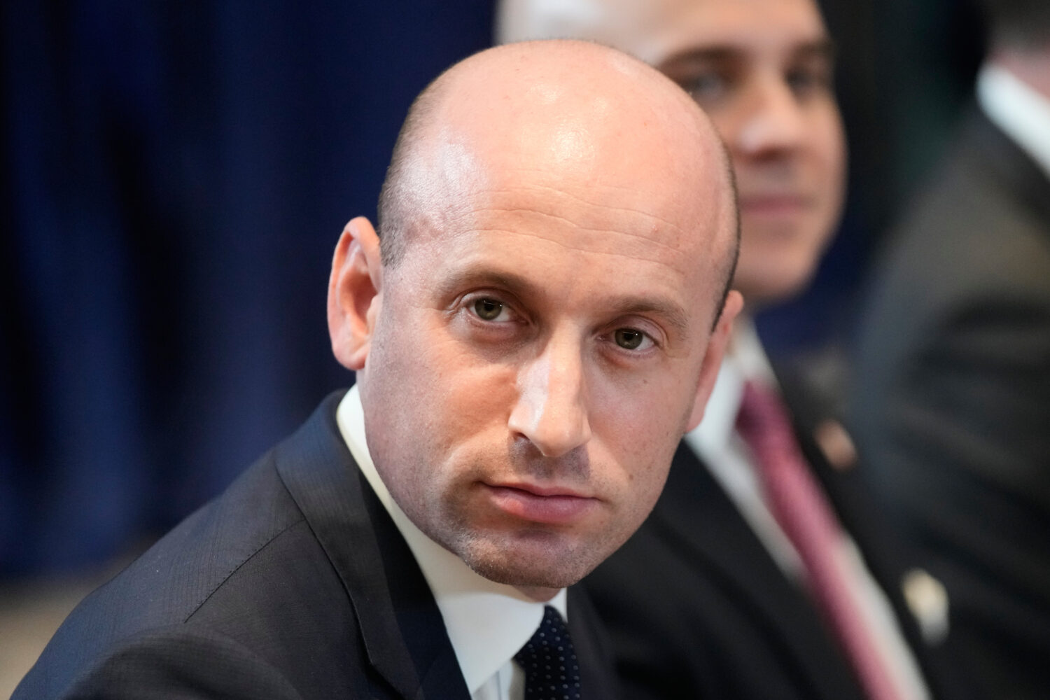 FILE - United States Homeland Security Advisor Stephen Miller reacts on the sidelines of the ASEAN ...