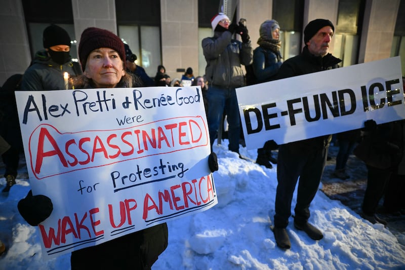Activists take part in a vigil for Alex Pretti outside of the US Department of Veterans Affairs in Washington, DC on Wednesday. Pretti, an intensive care nurse for the Department of Veterans Affairs, was killed on January 24, 2026 by federal agents in Minneapolis.