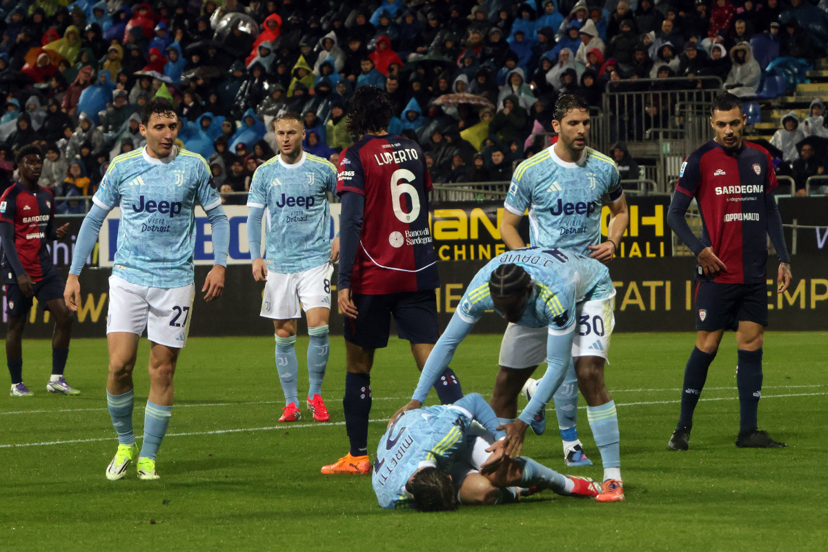 CAGLIARI, ITALY - JANUARY 17: Fabio Miretti of Juventus lays injured during the Serie A match between Cagliari Calcio and Juventus FC at Stadio Sant'Elia on January 17, 2026 in Cagliari, Italy. (Photo by Enrico Locci/Getty Images)