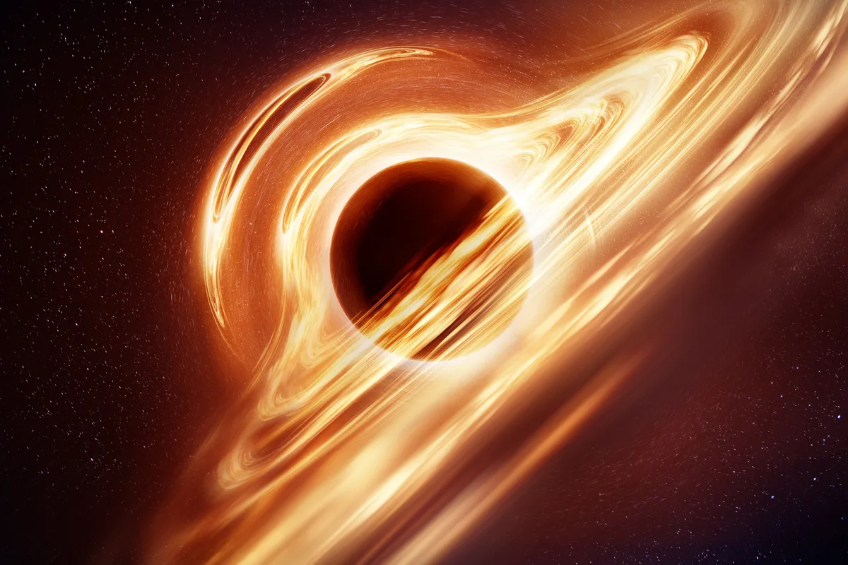 Artist's impression of a black hole. Credit: solarseven / Getty Images