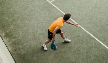 Aerial view of a padel tennis player ready to serve